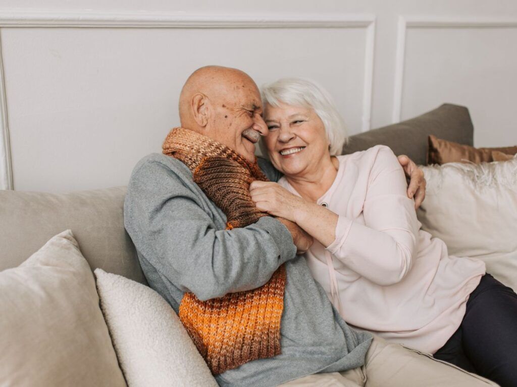 Nurse assisting a senior man in a wheelchair – skilled nursing facility placement for elderly care and post-hospital rehabilitation in Los Angeles.