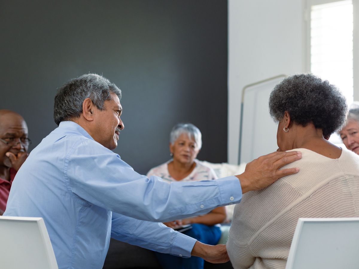 Older adults in a supportive community conversation, representing resource navigation for Los Angeles seniors.
